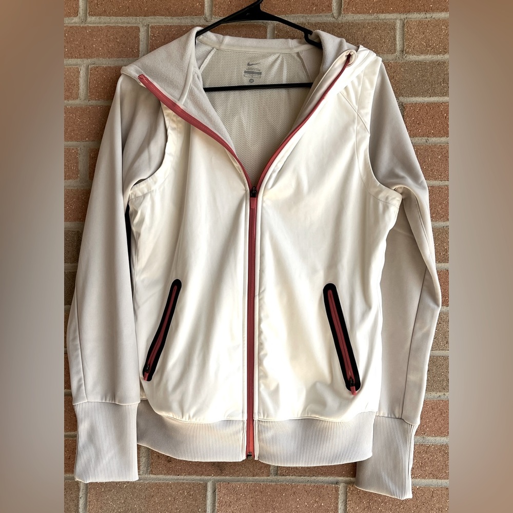 Nike woman’s hooded front zipper relaxed athletic running jacket. Size m